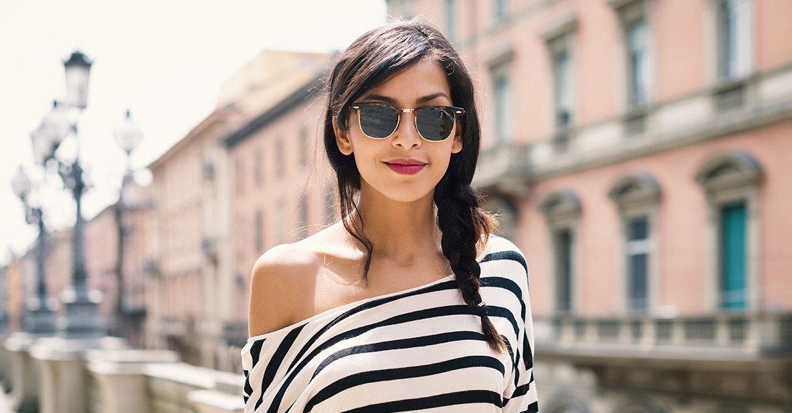 Woman wearing designer sunglasses